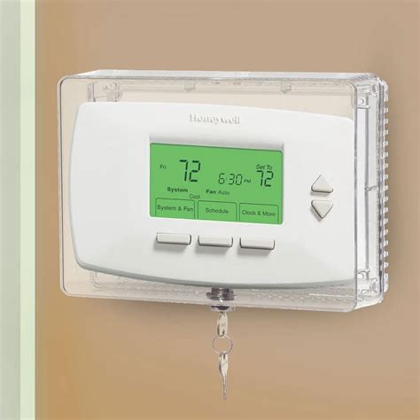 metal t-stat lock box|Honeywell CG512A1009 Large Size Thermostat Guard.